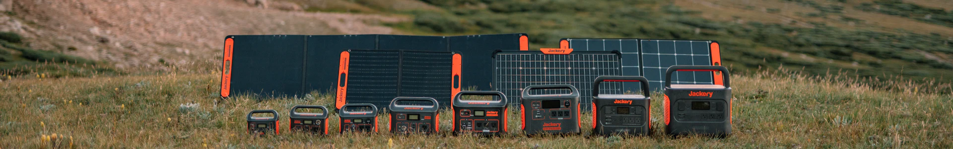 Jackery portable solar power stations and solar panels all lined up to compare sizes.